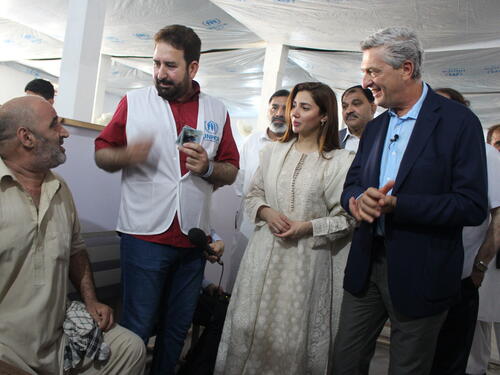 Pakistan. Goodwill Ambassador, Mahira Khan, observes as Afghan refugees go through resettlement process. 