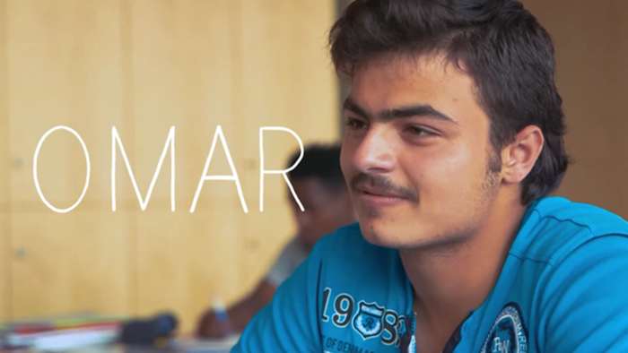 Omar in a classroom.