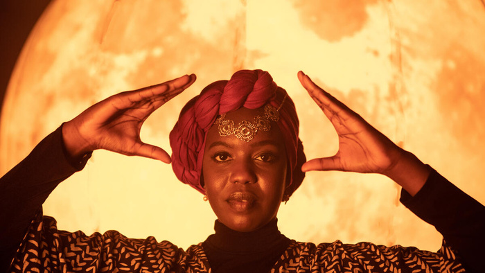 Emtithal (Emi) Mahmoud on set for the UNHCR production of her poetry film.