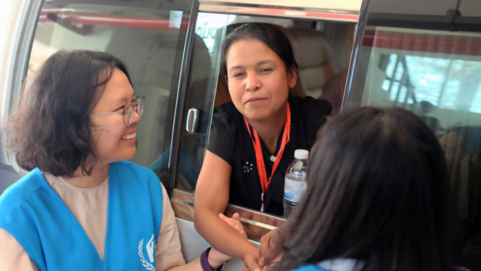 Play the video: A Day in the Life of an International UN Volunteer Working for UNHCR