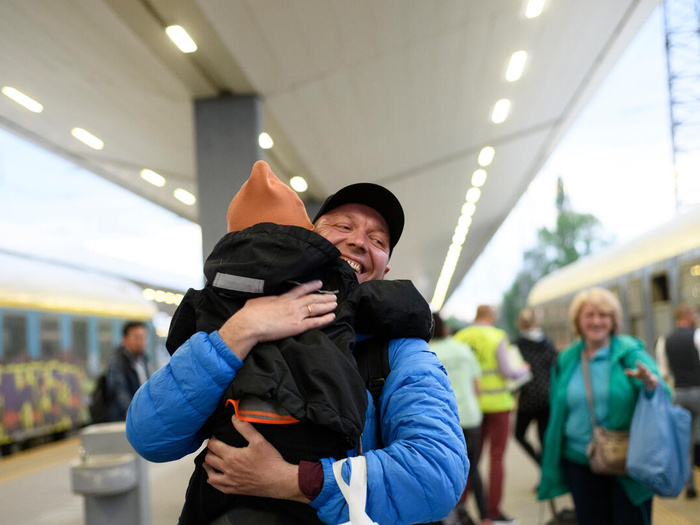 Ukrainian refugees reunite at a railway station in Sofia, Bulgaria.