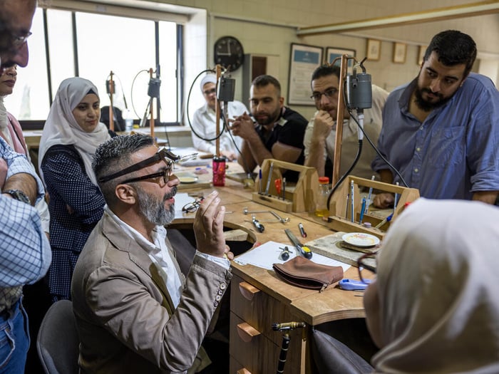 Jordan. Syrian asylum seekers participate in goldsmith selection process as part of the Work Corridor for Refugee initiative in Amman