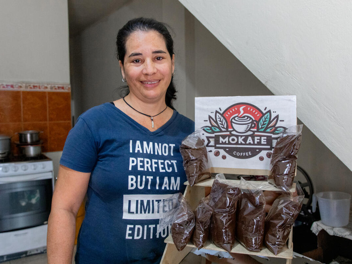 Ecuador. Lessny builds a new future for herself and her family with each bag of coffee she prepares for Ecuadorian customers