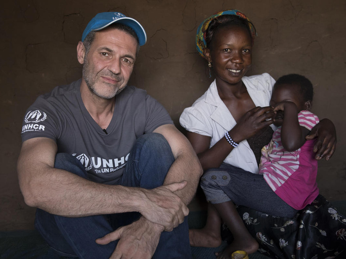 Uganda. UNHCR Goodwill Ambassdor Khaled Hosseini meets South Sudanese refugee, Aisha, in Bidibidi refugee settlement