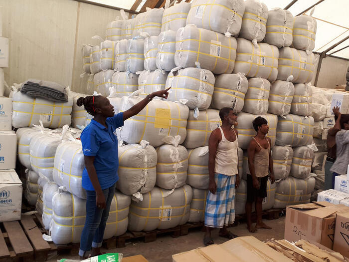 Robina at work in the UNHCR warehouse in Cox's Bazar, Bangladesh.