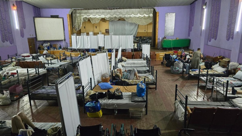 People sleeping at transit center.