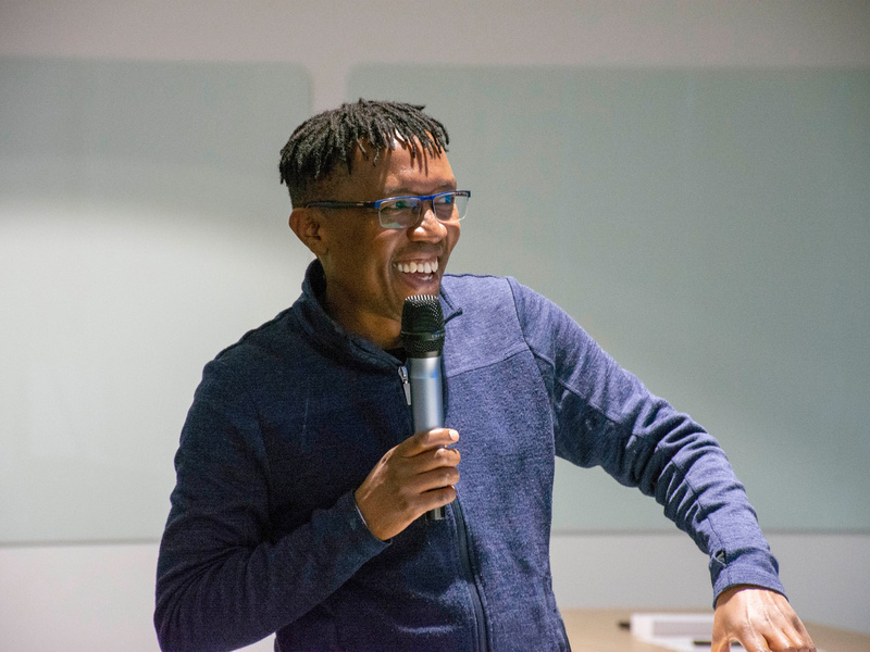 Ben Safari, head of UNHCR's Supply Management Service, talks into a microphone.