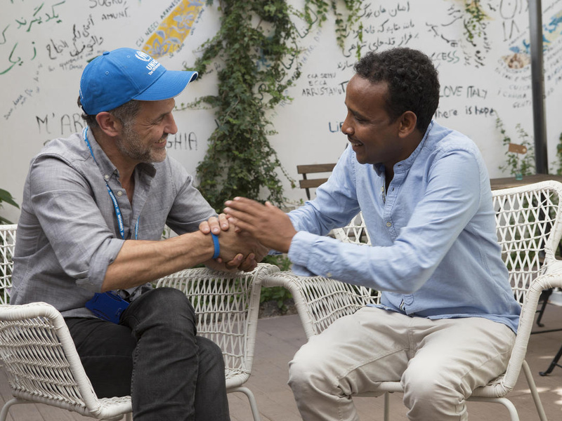 Italy. UNHCR Goodwill Ambassador Khaled Hosseini visits the refugee run restaurant, “Orient Experience”