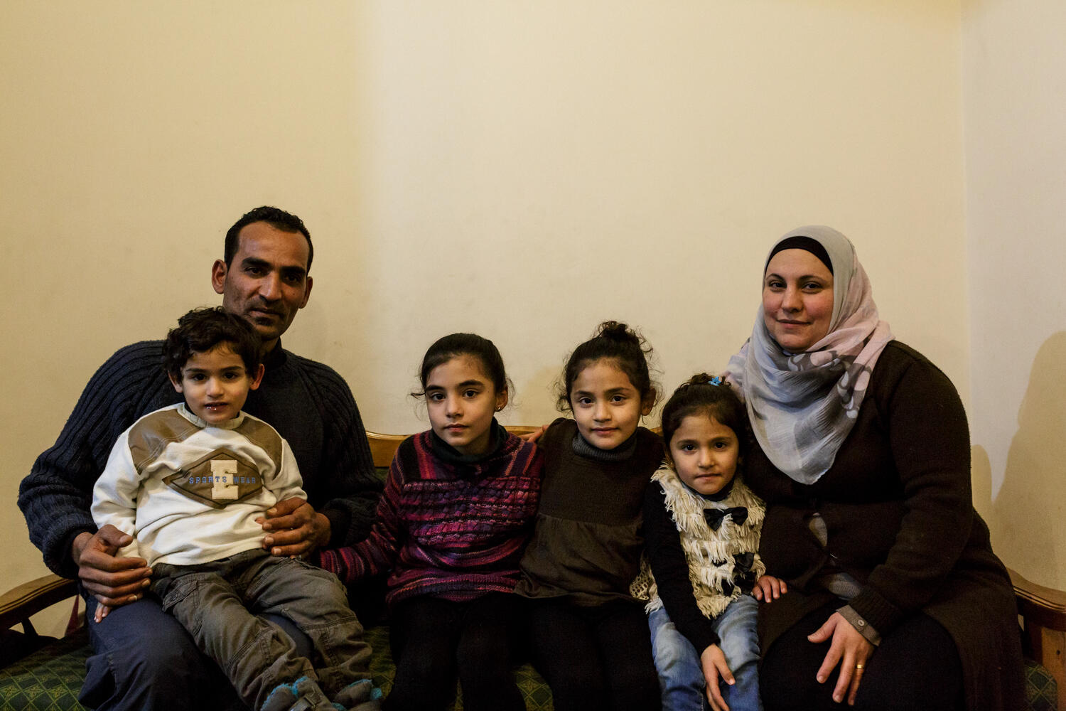 Greece. The Syrian electrician installing power at Lesbos refugee camp
