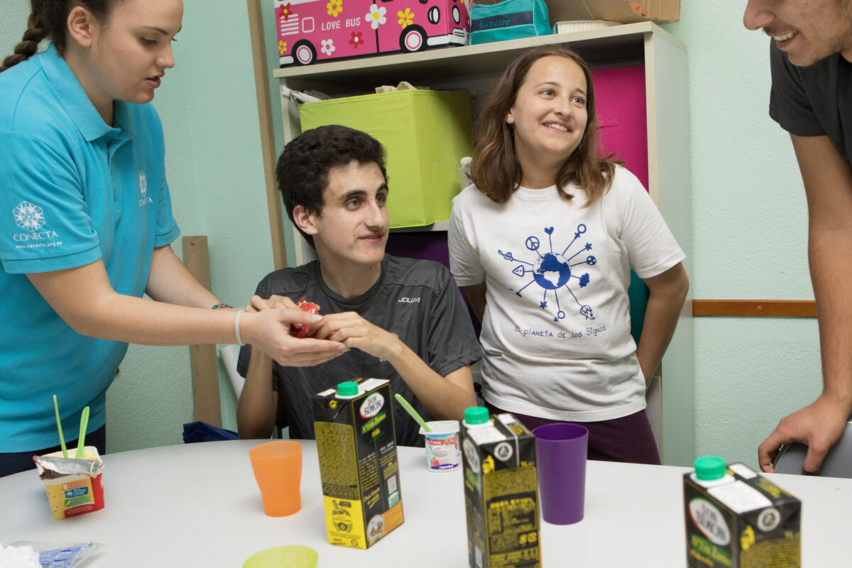 Spain. Syrian refugee youth volunteer at autism center