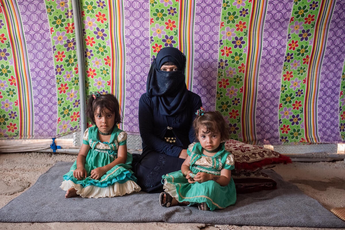 Iraq. People adjusting to life after losing their husbands and fathers.