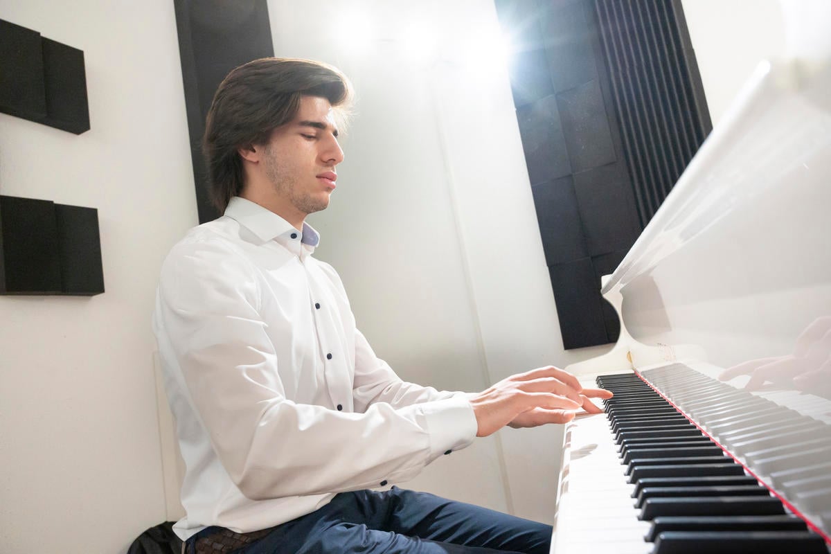 Austria. Musicians preparing for an important workshop in front of celebrity guests