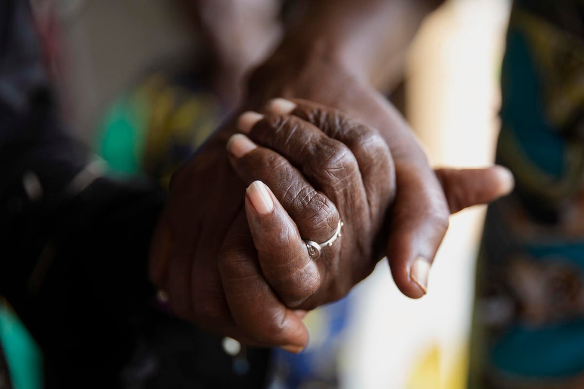 Central African Republic. Members of the "Standing Women" hold hands