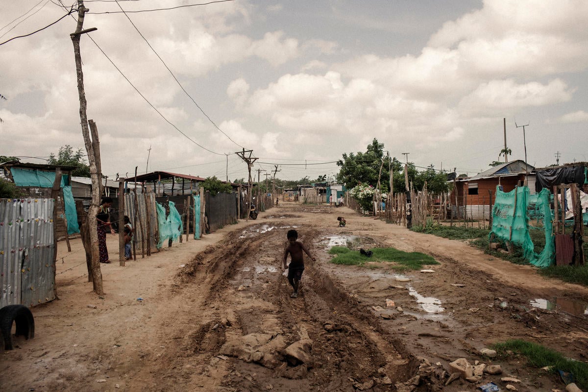 A boy at play in a neighbourhood in eastern Colombia that is home to thousands of Venezuelan refugees and migrants.