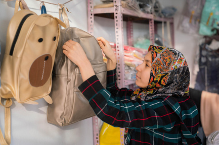 Woman selling school bags
