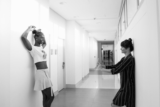 Helena Christensen photographs Maria Victoria Palacios in a white corridor