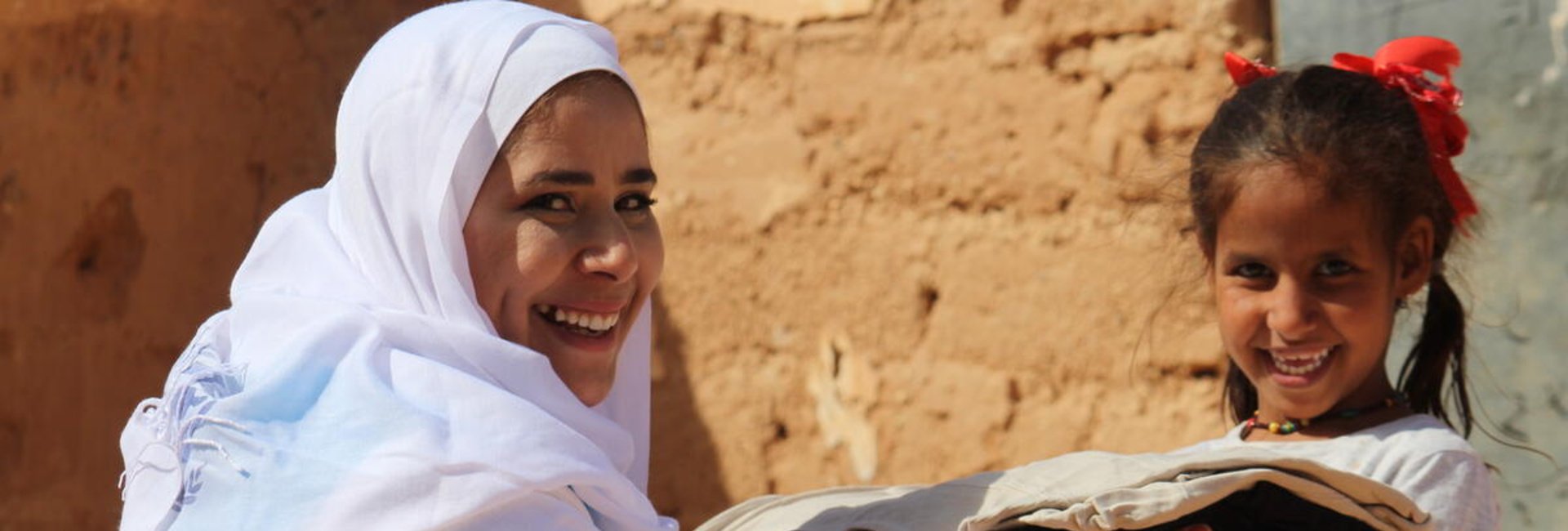 Algeria. UNHCR distribution of winter clothes donated by UNIQLO