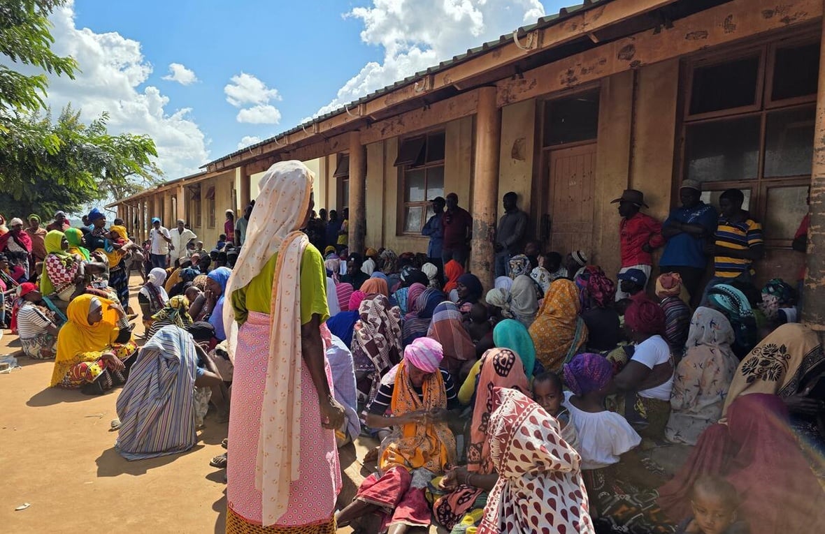 Mozambique. Newly displaced families from northern Cabo Delgado wait gather to register for assistance.