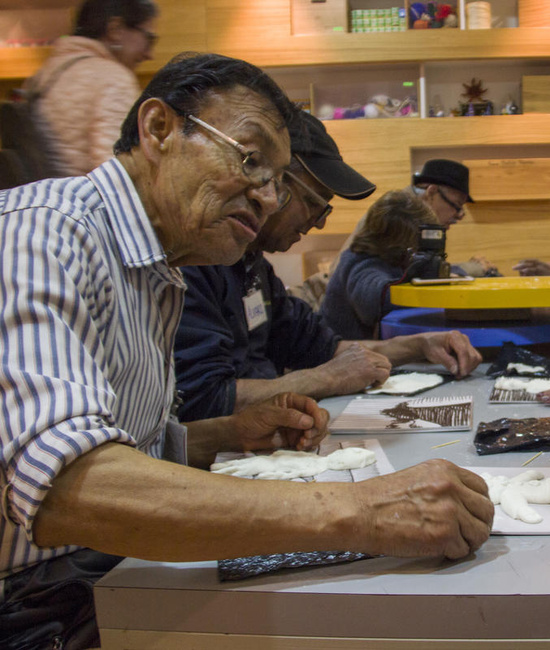 Elderly refugees enjoy a night at the museum