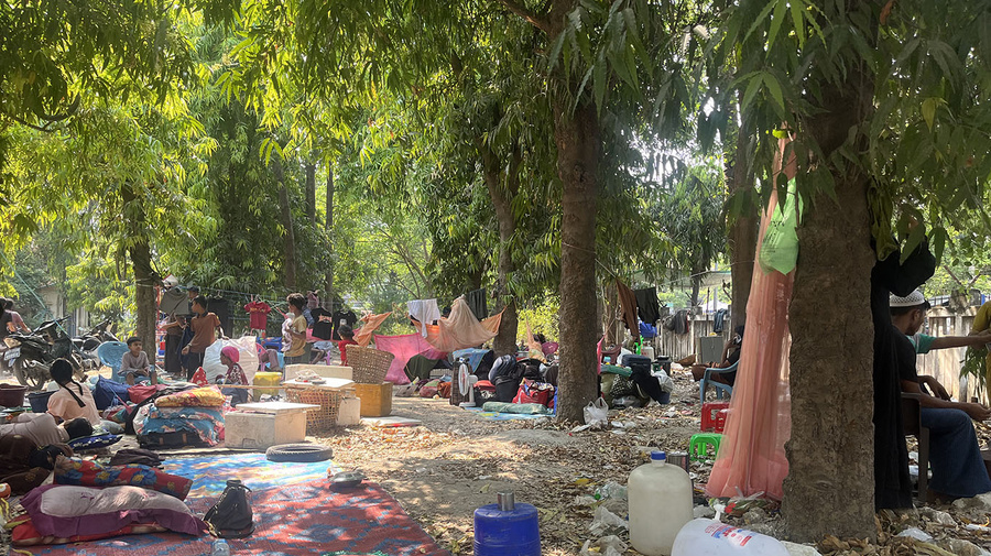 Families displaced from their homes by the earthquake that struck Myanmar on 28 March shelter in the open.