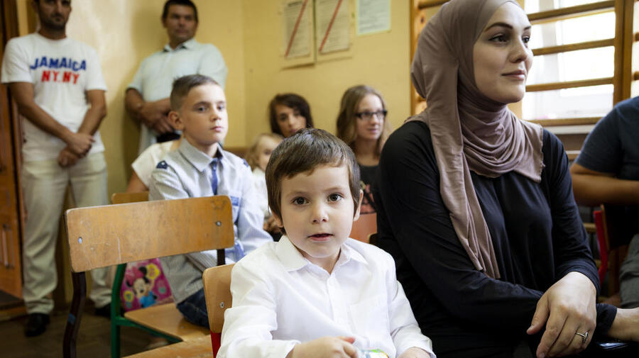 Poland. Chechen children mingle happily in village school