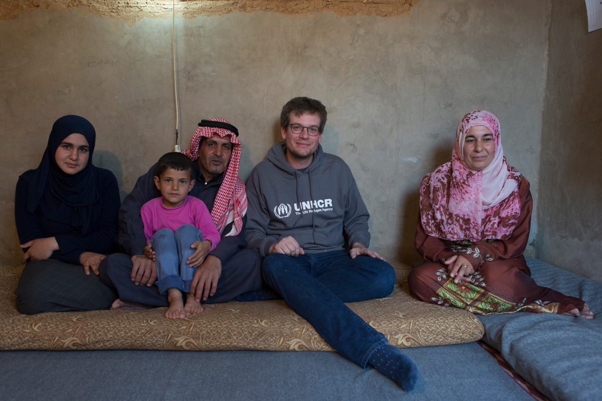 Jordan. UNHCR High Profile Supporter John Green visits Mousa Mohammad Al Ammari and his family.