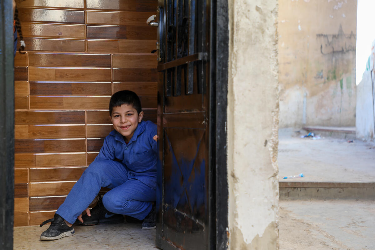 Jordan. A widow and mother of four children felt safe after crossing border to Jordan