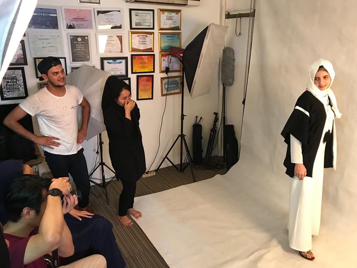 Indonesia. Fashion guru empowers refugees without legal rights to work or study