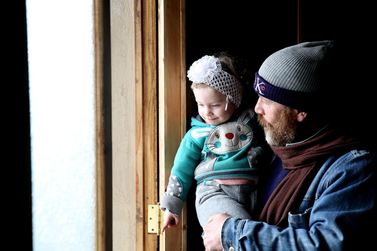 Syrian. Returnee family embrace their homing instinct