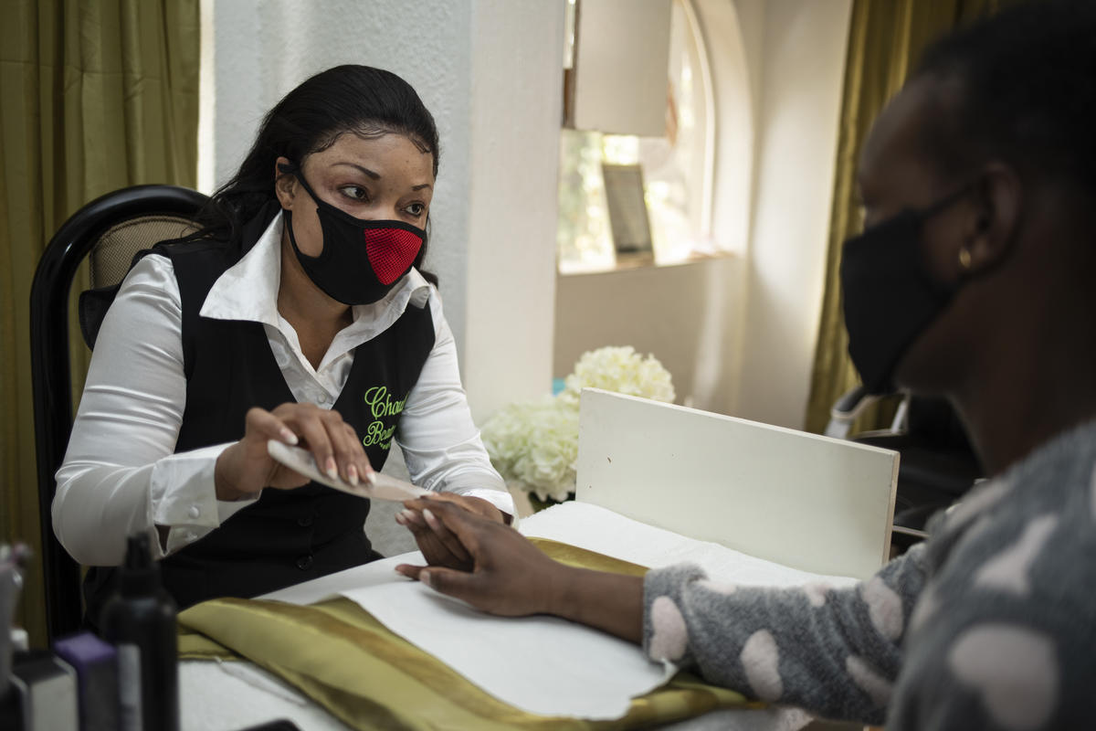 South Africa. Congolese beautician battles to keep her business afloat