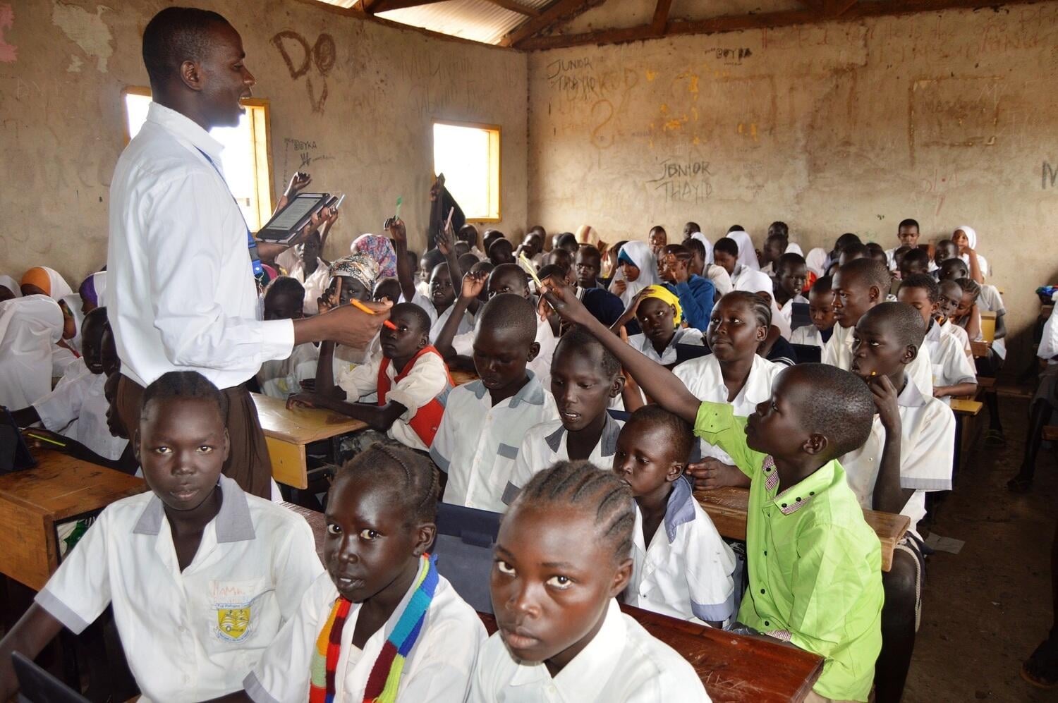 Kenya. Students using tablets under the Instant Network Schools project in Kakuma Refugee Camp