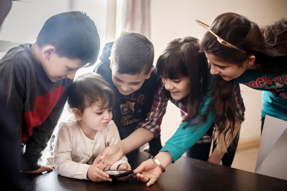Belarus. Refugee children of a resettled Syrian family spend Sunday together in their new home in Gomel