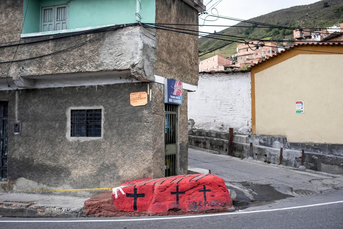 Colombia. Red stone in memory of a Venezuelan woman