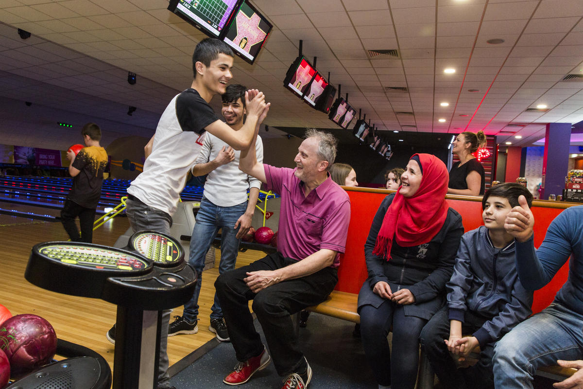 United Kingdom. Volunteers help Syrian family integrate in northern town