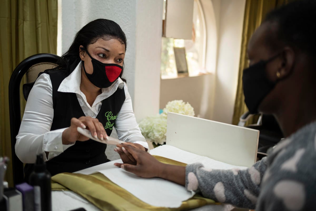 South Africa. Congolese beautician battles to keep her business afloat