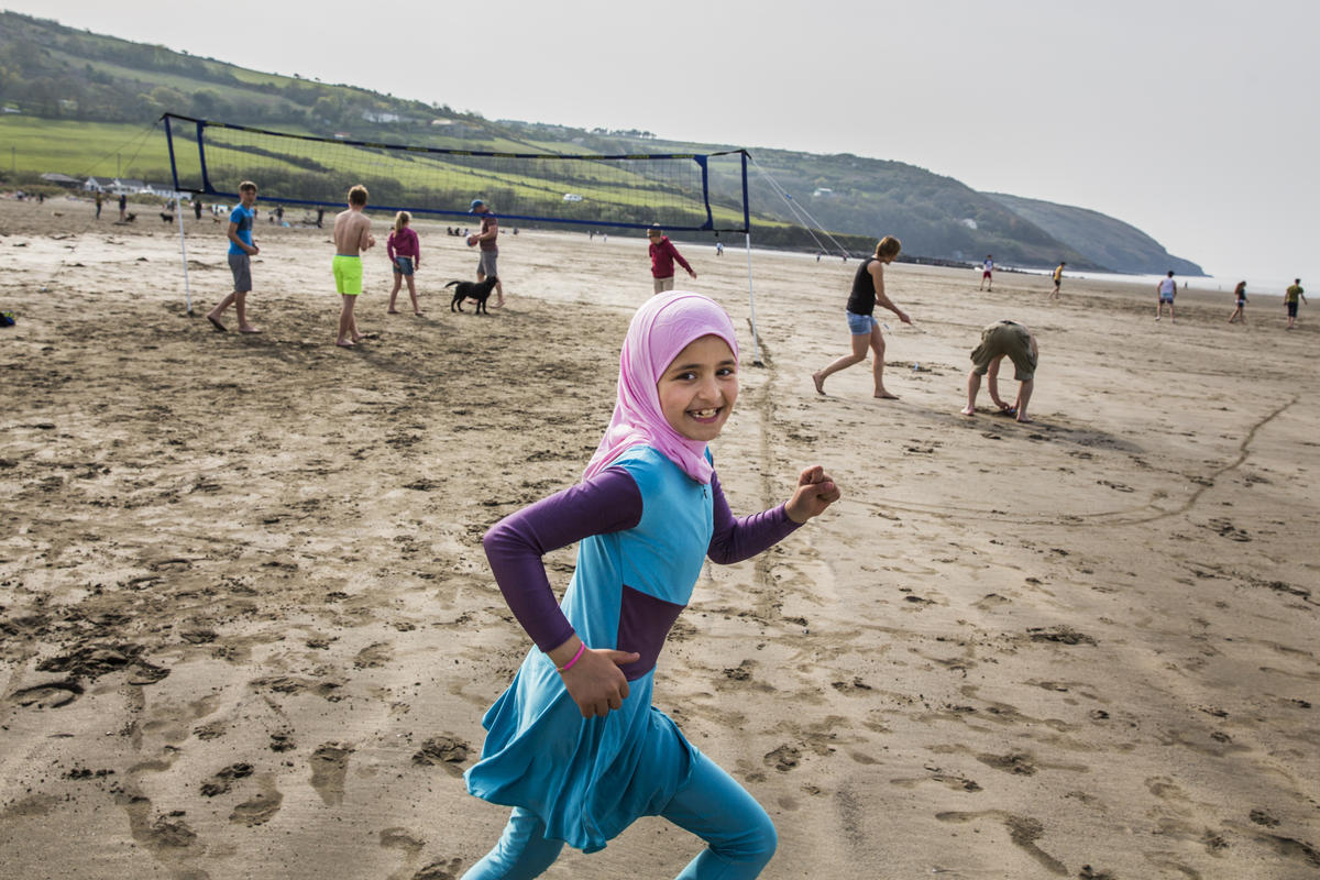 United Kingdom. Community volunteers help Syrian family integrate in Wales
