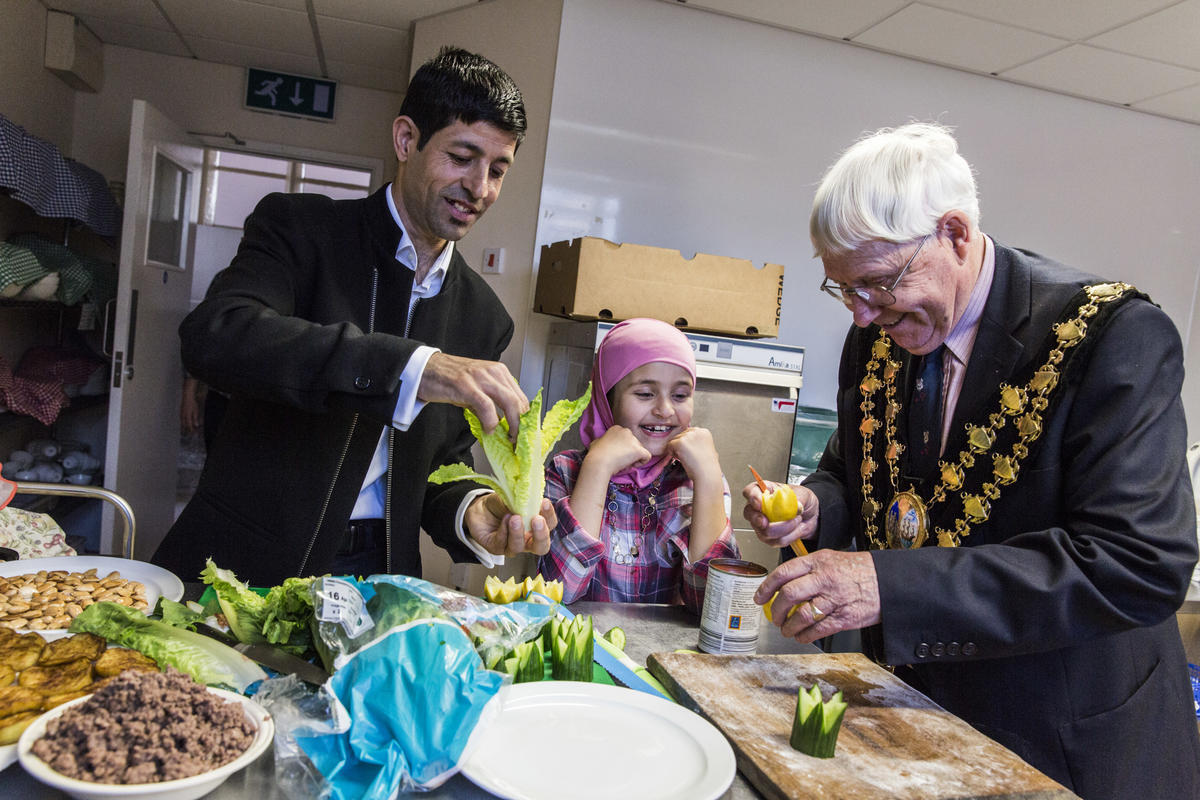 United Kingdom. Community volunteers help Syrian family integrate in Wales
