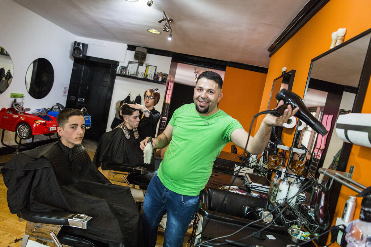 United Kingdom. Community volunteers help Syrian family integrate in Wales