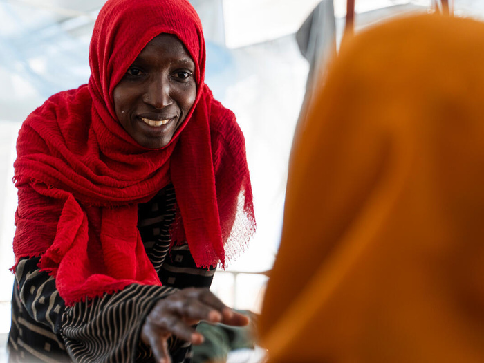 Chad. Thousands of Sudanese refugees continue to flee across the border.