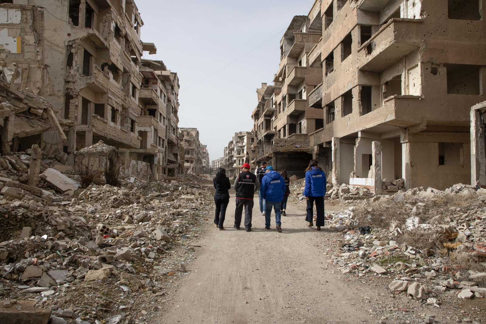 RHF and UNHCR Syria delegation visiting a severely damaged home in Harasta, Rural Damascus.