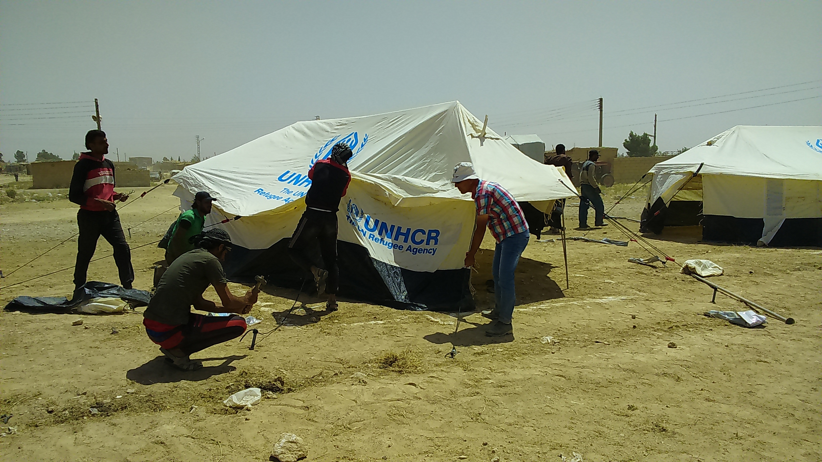 Syria heatwave makes life for Iraqi refugees even tougher