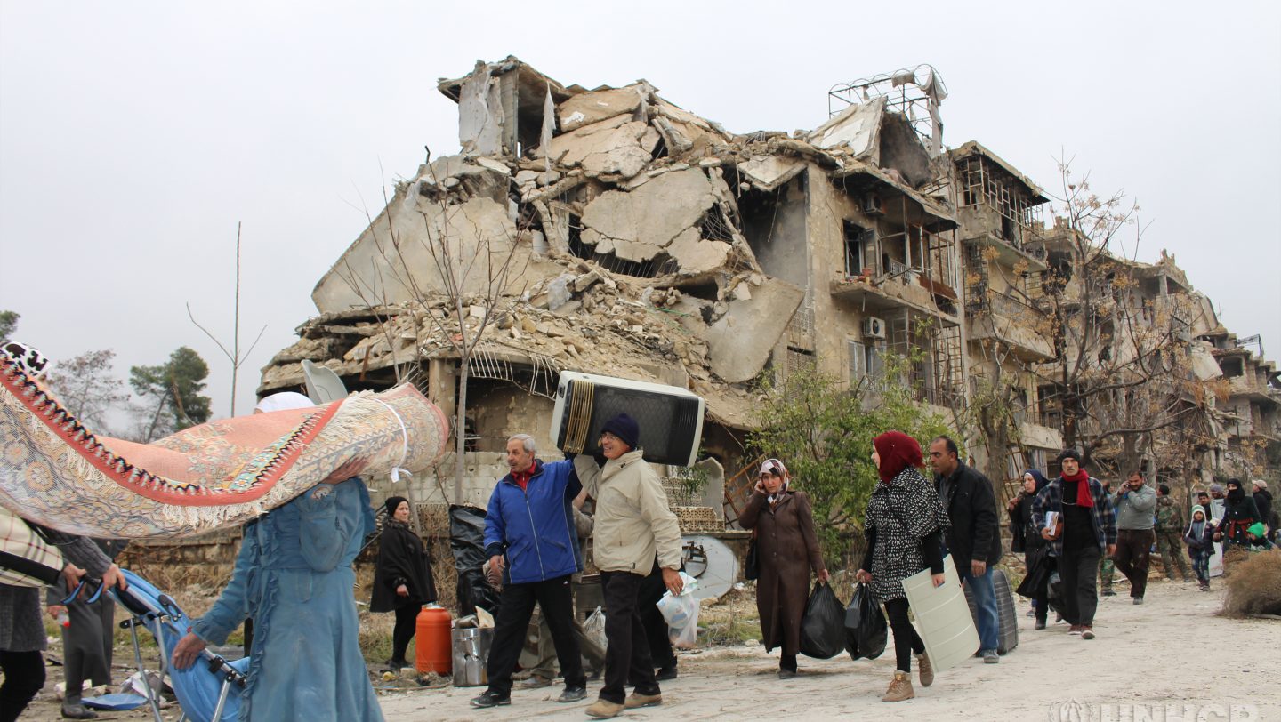 People from East Aleppo visits to check on their damaged houses
