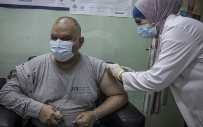 Refugees receive COVID-19 vaccinations in Jordan