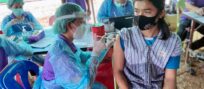 Dispelling anxieties, medics and refugee volunteers join forces to vaccinate refugees in Thailand