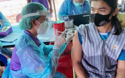 Dispelling anxieties, medics and refugee volunteers join forces to vaccinate refugees in Thailand