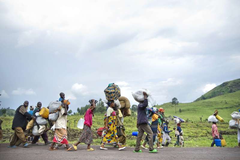 Democratic Repubic of Congo ( DRC ) / Thousands flee the IDP site and surrounding area in Kibati, north Kivu, Democratic Republic of Congo (DRC) on Friday, November 7, 2008.  Gunfire was heard near the IDP site causing a panic leaving a steady stream of IDPs heading south towards the provincial capital Goma. 