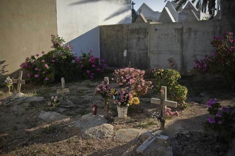 Graves of people who died trying to make the journey from Libya to Lampedusa. The identities of most are unknown because they did not carry papers. 