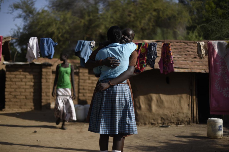 Esther sees her cousin in Kakuma camp at the end of each term. Esther's immediate family are in South Sudan; she hasn't seen them in over two years.