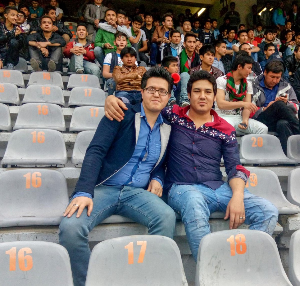 Zia (left), 24, watched a football match between Iran and Afghanistan in March along with 80,000 Afghans at Azadi Stadium in Tehran.