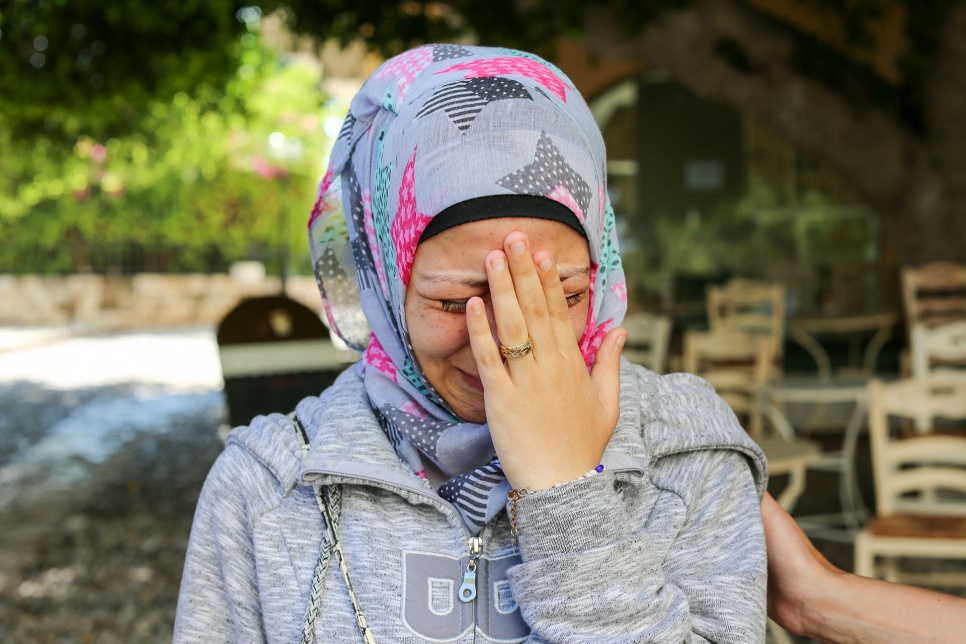 <strong>Kos, Greece</strong><br><br>"My husband and I sold everything we had to afford the journey. We worked 15 hours a day in Turkey until we had enough money to leave. The smuggler put 152 of us on a boat. Once we saw the boat, many of us wanted to go back, but he told us that anyone who turned back would not get a refund. We had no choice. Both the lower compartment and the deck were filled with people. Waves began to come into the boat so the captain told everyone to throw their baggage into the sea. In the ocean we hit a rock, but the captain told us not to worry. Water began to come into the boat, but again he told us not to worry. We were in the lower compartment and it began to fill with water. It was too tight to move. Everyone began to scream. We were the last ones to get out alive. My husband pulled me out of the window. In the ocean, he took off his life jacket and gave it to a woman. We swam for as long as possible. After several hours he told me that he was too tired to swim and that he was going to float on his back and rest. It was so dark we could not see. The waves were high. I could hear him calling me but he got further and further away. Eventually a boat found me. They never found my husband."